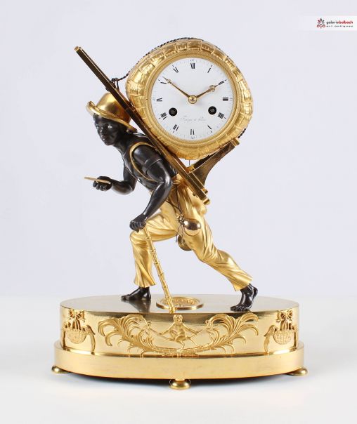 Orologio da camino francese antico - Parigi
Bronzo (dorato a fuoco e patinato), smalto
Impero intorno al 1810