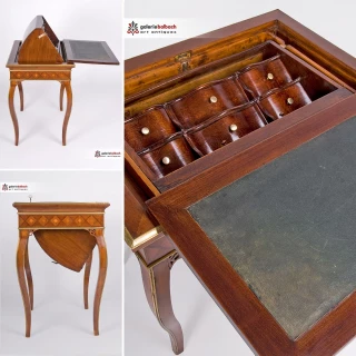 A very special piece of furniture!

Some call it a transformation secretary, others simply a magic table.

Officially, this piece of furniture is called "Secrétaire à culbute" and it can be transformed from a side table into a ladies secretary in just a few steps.