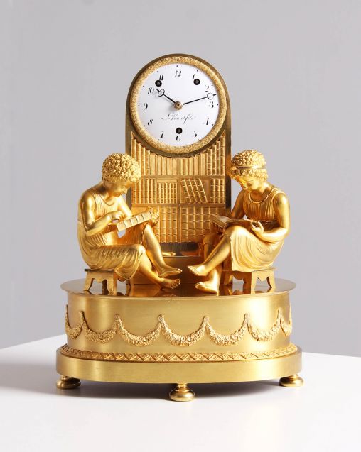 Pendolo antico, orologio da caminetto francese del 1820 circa, La Bibliotheque - Parigi
bronzo dorato a fuoco, smalto
Impero 1820 ca.