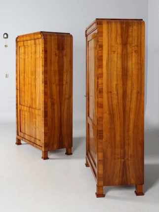 Two identical antique cupboards