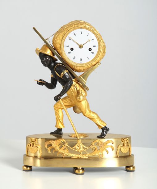 Pendule Au Negre, Portefaix, Jean-Andre Reiche, Empire, circa 1810 - Paris
Bronze, Emaille
Empire um 1810
