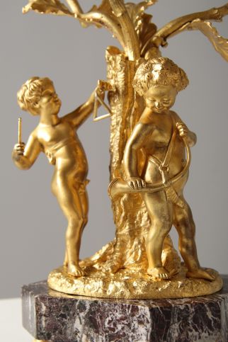 Piccoli putti con strumenti musicali