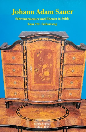 Pubblicazione di accompagnamento al 250° compleanno del mobiliere di Fulda Johann Adam Sauer (1745-1822). Il volume documenta la vita e l
